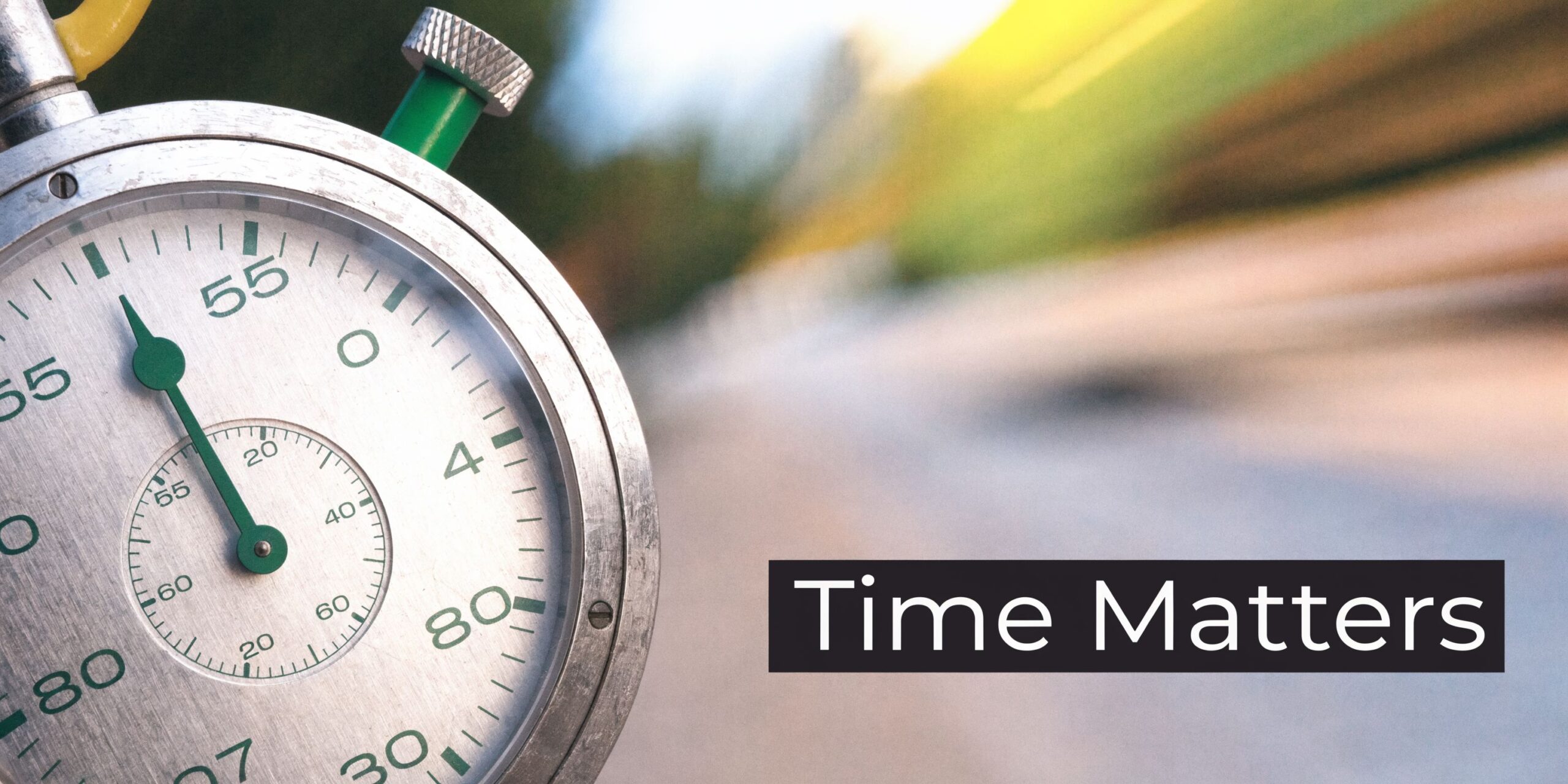 A close-up of a vintage analog stopwatch with the text Time Matters superimposed on the right.